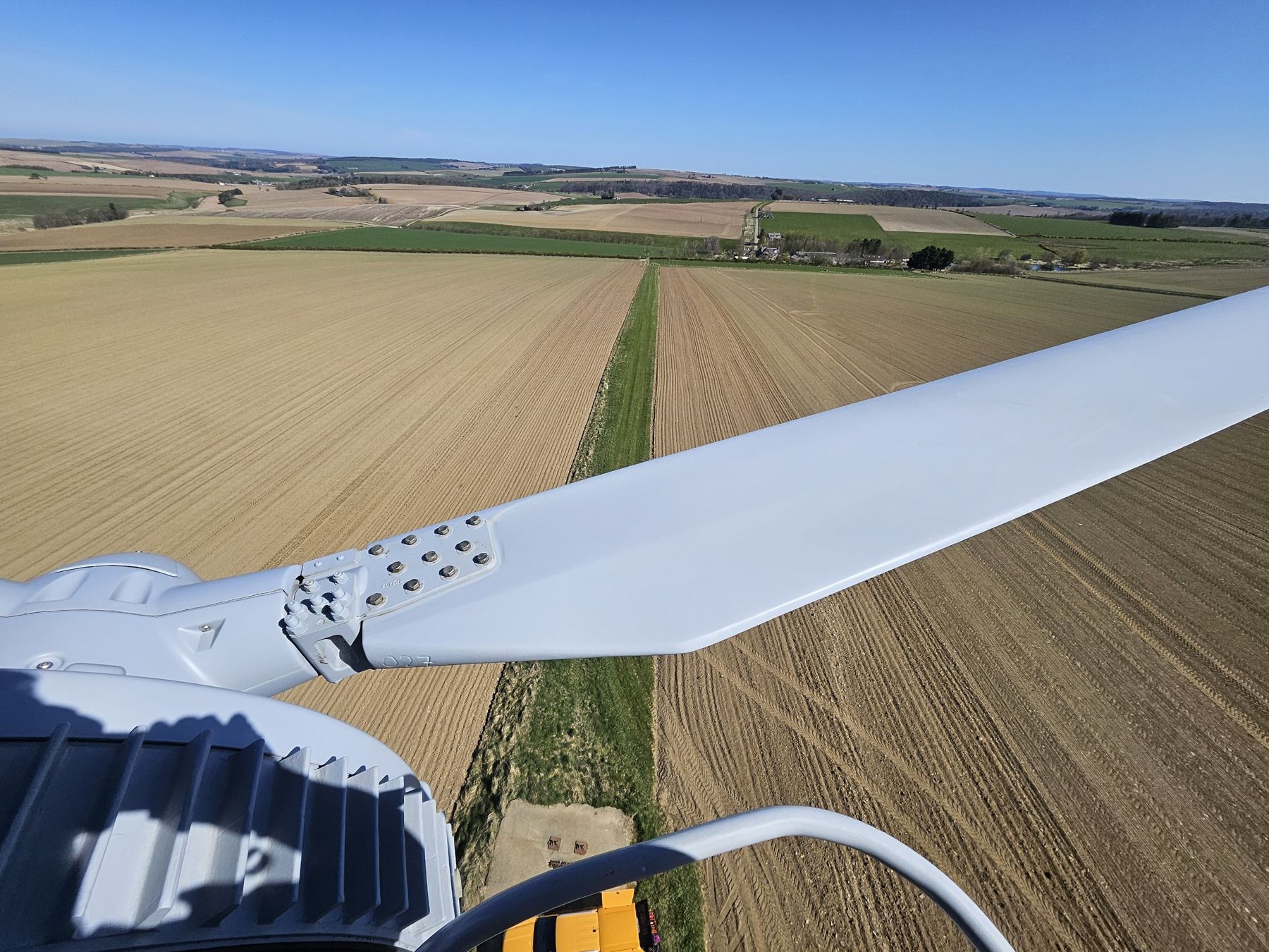 View across farmland from the top of a wind turbine